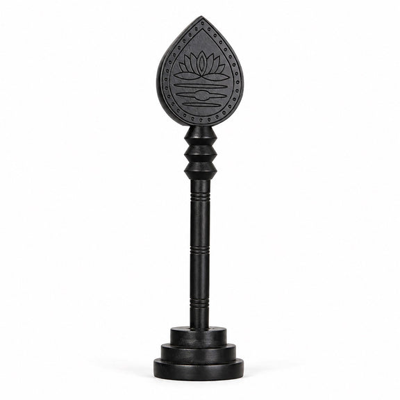 Dark wooden vel with engraved lotus teardrop head and round base stand