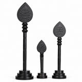 Set of three dark wooden vel sticks with engraved lotus teardrop heads and bases