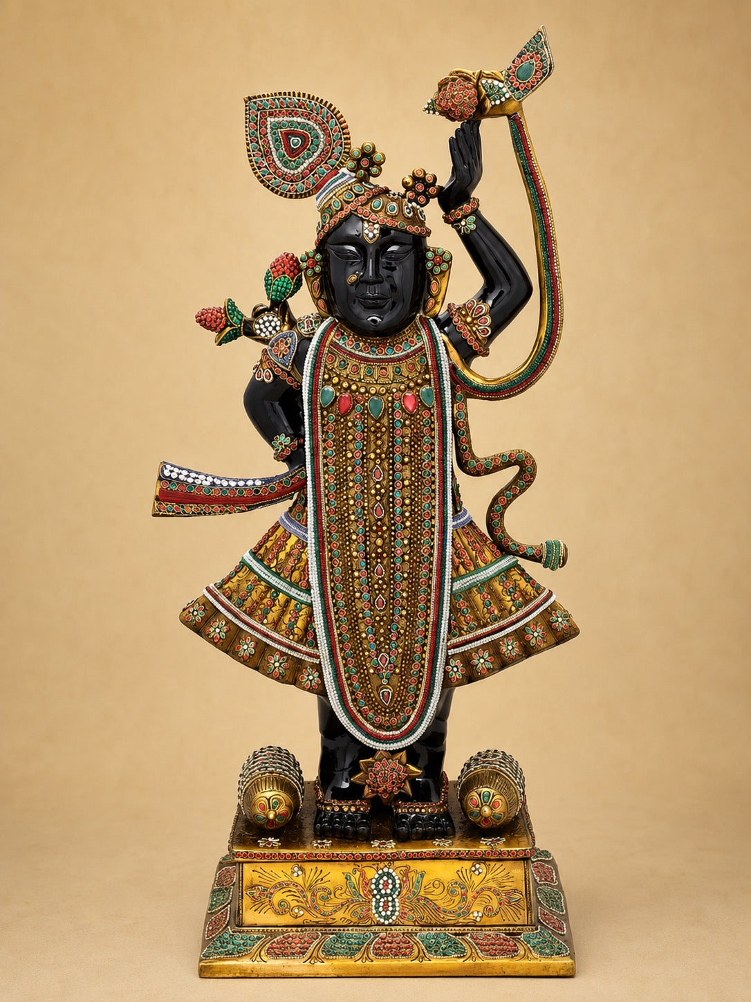 Brass Shrinath Ji idol with colorful inlay, both arms raised, decorated gold pedestal