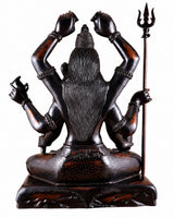 Back view bronze-finish six-armed seated Lord Shiva statue with trident on side