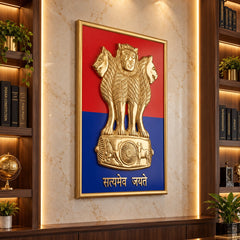Angled view of the brass Ashoka emblem wall hanging in a gold-toned wooden frame.