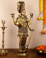 Brass Lord Vishnu idol, 40-inch tall, profile view with staff-like arm and crown
