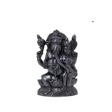 Dark metallic Ganapati statue with ornate crown, seated with smaller attendant figure