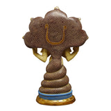 Back view Patanjali statue with scaly brown fan back, golden arms, blue-and-gold base.