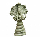 Antique green Patanjali brass statue, side view with ornate standing arch