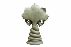 Antique green Patanjali brass statue, rear view with textured halo-like arch