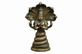 Brass Patanjali statue, antique golden finish, seated figure with ornate halo and hands clasped