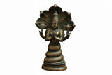 Brass Patanjali statue, antique golden finish, front view of seated figure with halo