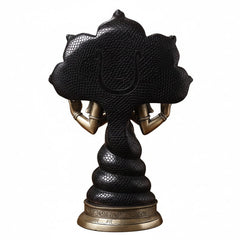 Patanjali yoga statue, back view with textured black torso and gold base.