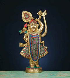 Brass Shreenathji murti with multicolour stonework, one arm raised, flute-holding pose