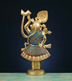 Brass Shreenathji murti in profile, multicolour stonework outfit and raised arm