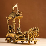 Brass chariot sculpture with banner, four horses, seated figures and ornate pillars