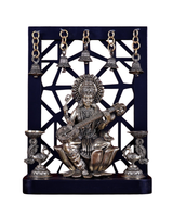 Brass Saraswati idol on lotus with hanging bells and annam-style oil lamps