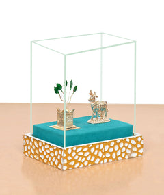 Glass display with white metal Kamdhenu cow and tulsi plant, 5 inch height