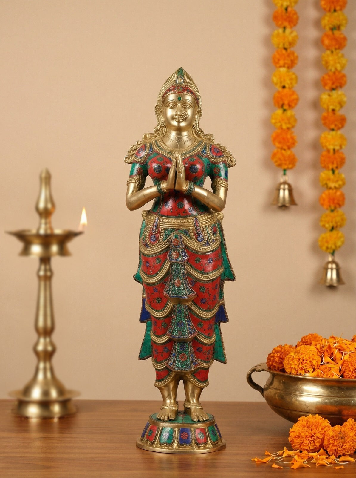 Large brass Namaste lady statue in Anjali mudra, red/teal patterned dress