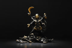 Brass Kali Maa idol: seated figure with crescent above head and raised arms