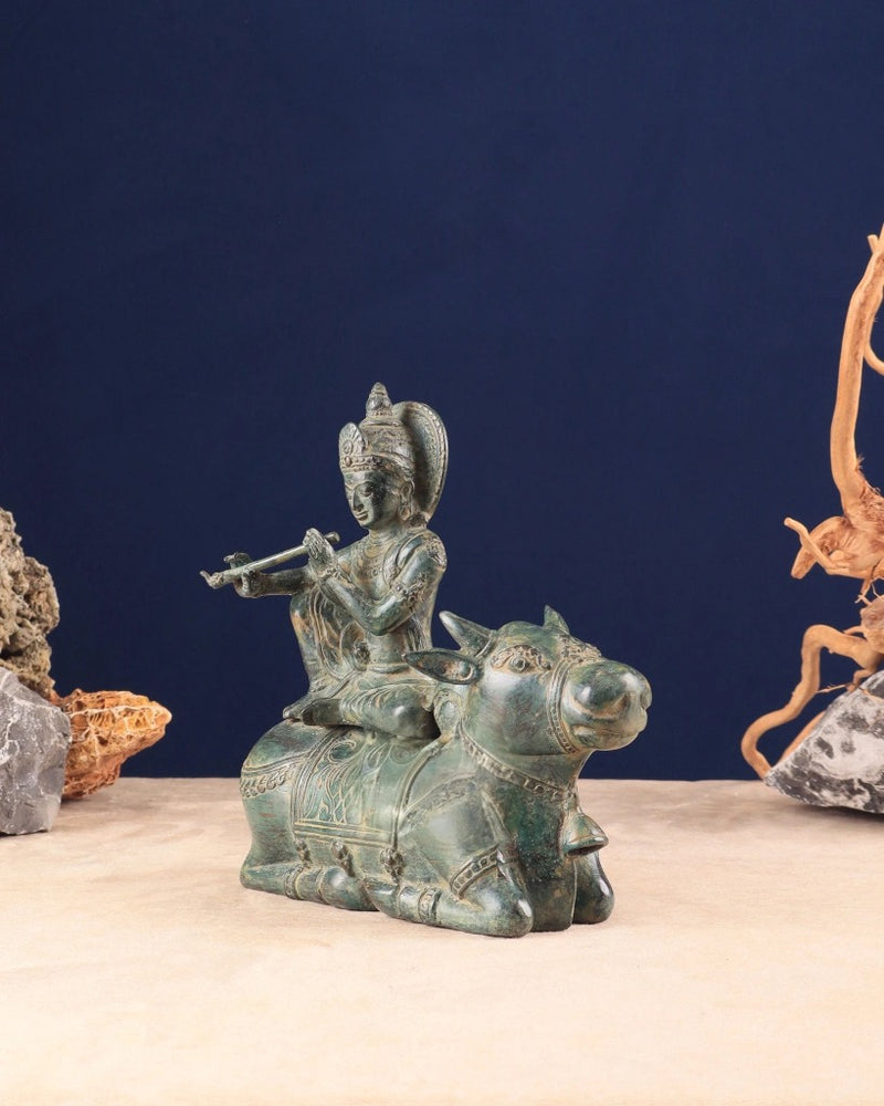 Indonesian Bronze Lord Krishna Sitting on Cow Idol (Height: 9 inch)