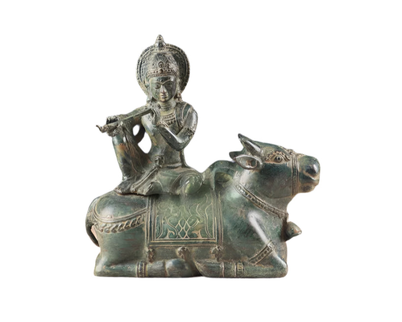 Indonesian Bronze Lord Krishna Sitting on Cow Idol (Height: 9 inch)