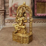 Brass Maa Lakshmi idol seated on square base, raised arm, gold relief details