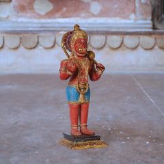 Brass Hanumanji idol, front view holding a gold mace, red hands and blue patterned dhoti