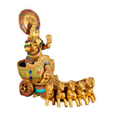 Brass Surya Rath idol with stone inlay, angled view of seated deity and horse parade base