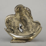 Brass Shiva Parvati moon idol, back view with engraved hair texture on crescent base
