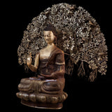 Brass seated Buddha statue with Tree of Life branches, hands in blessing pose