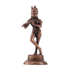 Copper Krishna figurine, close side angle, dancer with flute and detailed face on base