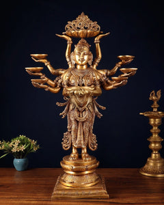 Brass deep lady figurine with ten arms, ornate crown and headdress, standing pose