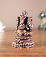 Pure copper Lord Ganesha idol from side, detailed hands and ornaments, 2 inches