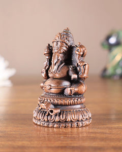 Pure copper Lord Ganesha idol from side, detailed hands and ornaments, 2 inches
