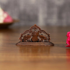 Pure Copper Gajalakshmi idol 1.5 inch, rear view with elephants under decorative arch.