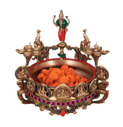 Ashtalakshmi brass urli with diyas, deity centerpiece, decorated rim, 16 in