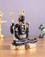 Side view Lord Shiva brass murti in dhyaan mudra, holding trident and damaru