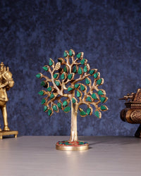 Kalpavriksha tree figurine, pure brass with green stone leaves; front view on round base