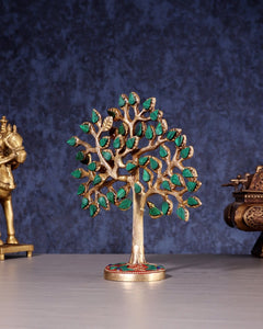 Kalpavriksha tree figurine, pure brass with green stone leaves; front view on round base