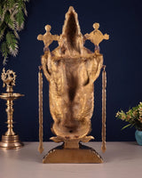 Back view of brass Tirupati Balaji idol with raised crown and hanging arm ornaments