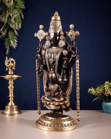 Standing Tirupati Balaji brass idol with crown and four arms, gold-toned pedestal