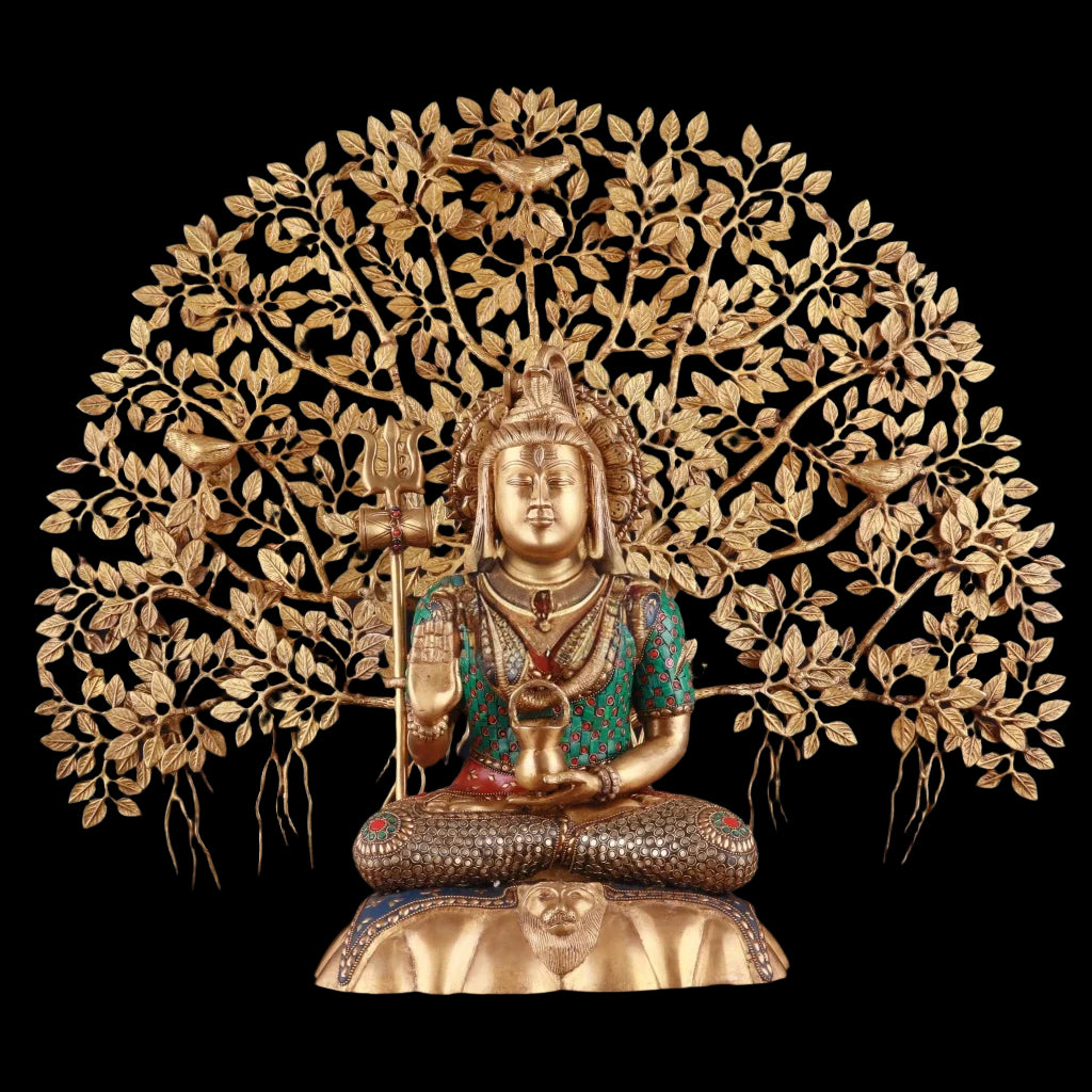 Brass Shiva statue seated, holding trident; Kalpavriksha tree with gold leaves