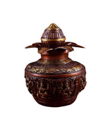 Heavy brass kalash with Ashtalakshmi lid, lotus-like base and carved figures, 11 in