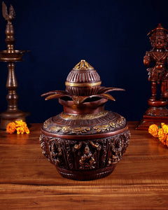Front view heavy brass Ashtalakshmi kalash with embossed deities, decorative lid, 11 in