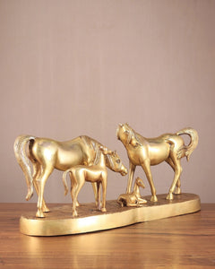 Brass horse family sculpture, group of horses in profile on oval base