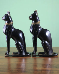 Pair of Egyptian black cat brass figures, rear side view, gold collar band