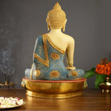 Back view Tibetan Buddha statue, blue robe panel, gold-toned head, round base