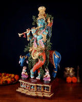 Hand-painted brass Lord Krishna statue with flute and cow, detailed gold crown