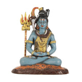 Lord Shiva brass statue with blue face, gold jewelry, hands resting, trident flames