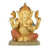 Brass Ganesha statue with raised hands and detailed crown, seated on patterned base