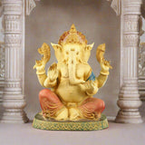 Elegant Ganesha brass statue, seated with four arms and ornate crown, 21.5 in