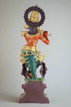 Brass Lord Krishna figurine from back, tall halo crown and teal draped outfit
