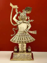 Brass Shri Krishna thakur ji statue, side view showing tall headdress and curved arm pose